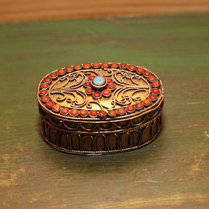 Vintage Tibetan Brass Pill Box - Tiny Brass Box Filigree Decor with Red and blue beads - Ethnic Pill Box