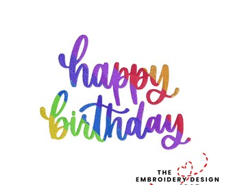 May include: A colorful "Happy Birthday" design in a script font, with a rainbow gradient of colors. The text is set against a white background. The design includes the text "THE EMBROIDERY DESIGN SPOT".