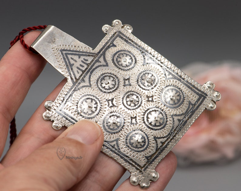 Antique silver pendant from Morocco with a minimalist silk rope
