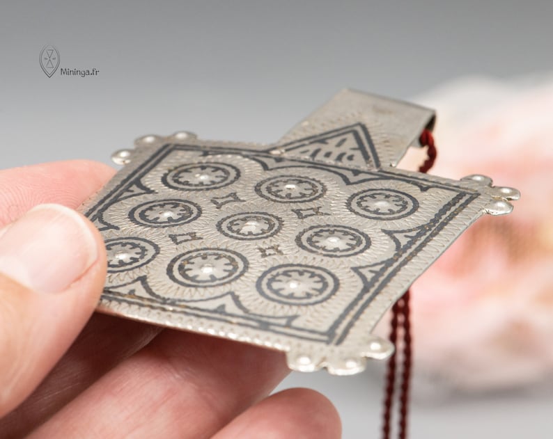 Antique silver pendant from Morocco with a minimalist silk rope