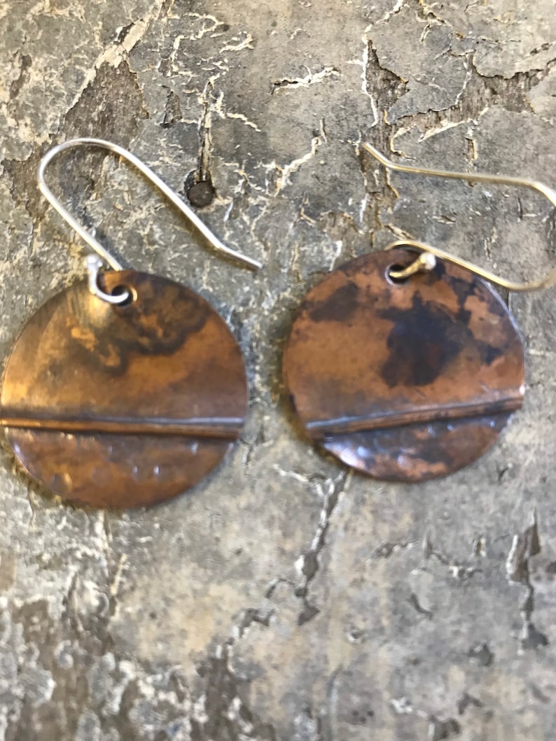 Dark brown copper textured copper earrings.