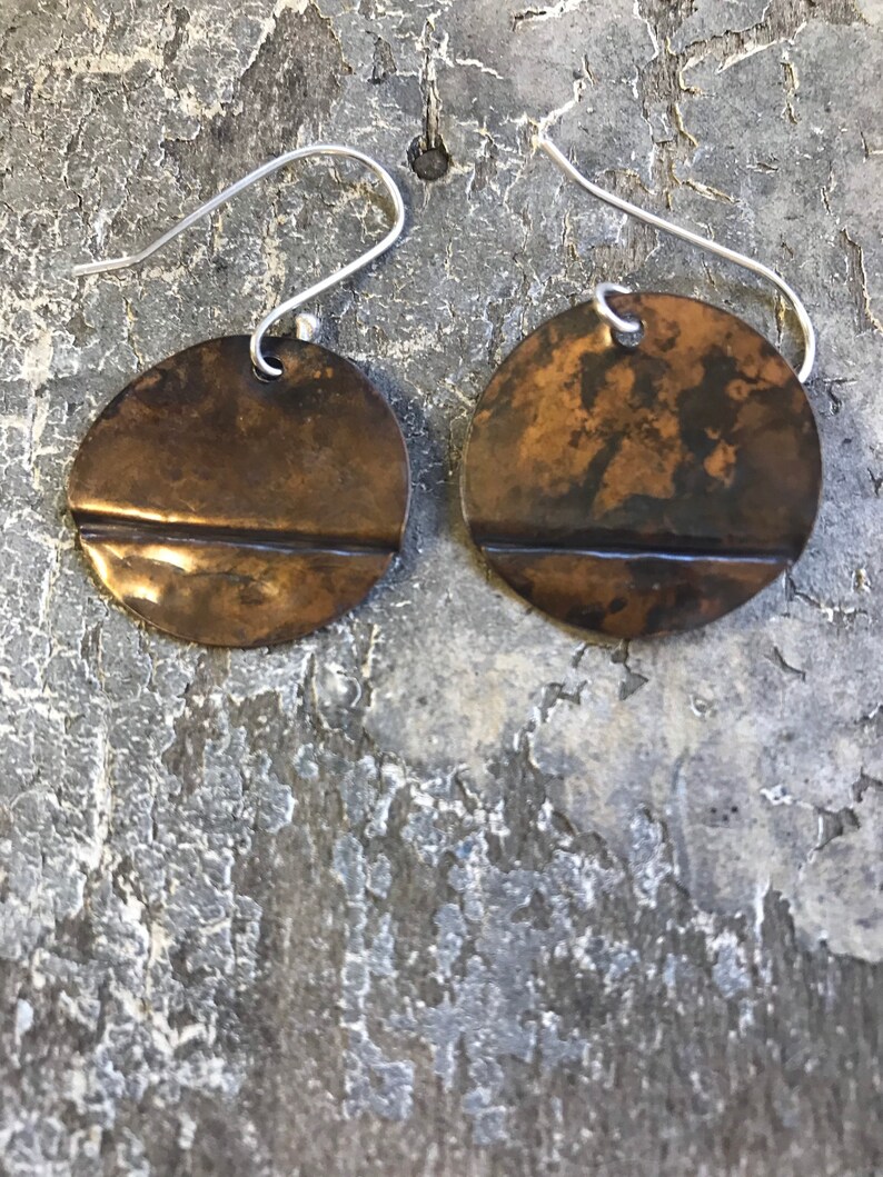Dark brown copper textured copper earrings.