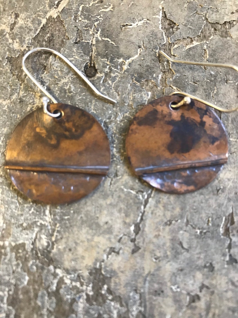 Dark brown copper textured copper earrings.