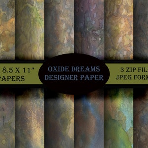 May include: Twelve digital paper designs in a collage format. The papers feature abstract watercolour patterns in shades of brown, green, blue, and purple. The text "OXIDE DREAMS DESIGNER PAPER" is displayed in the centre of the image.
