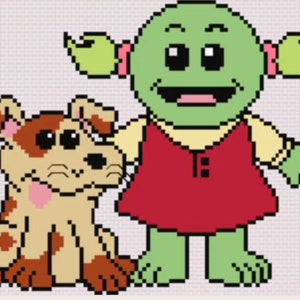 May include: A green cartoon character with pigtails and a red dress is standing next to a brown and white cartoon dog. The dog has brown ears and a pink nose.