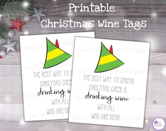 May include: Printable Christmas wine tags featuring a green elf hat with a yellow stripe and the text "The best way to spread Christmas cheer is drinking wine with all who are near."