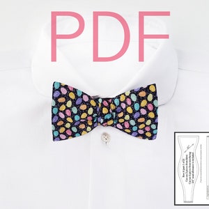 Peut inclure: Un patron PDF pour un nœud papillon avec un motif de confettis colorés. Le patron comprend deux pièces, chacune mesurant 14 pouces avec une marge de couture.