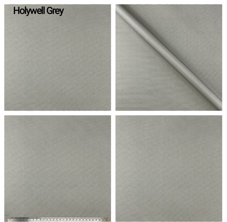 Puede incluir: Primer plano de una tela gris con una textura sutil tejida. La tela se llama "Holywell Grey".