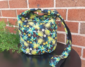 Slouchy crossbody hobo bag for women. Comfortable hippie style bag made with yellow floral cotton with pockets and lined. Boho handbag gift