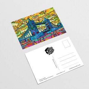 May include: A colorful illustration of the Tower Bridge in London, England. The bridge is depicted in shades of blue, yellow, orange, and green. The sky is a vibrant yellow with orange and pink clouds. The postcard is blank on the back with space for a message and a stamp.