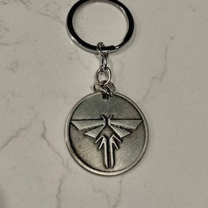 Get your Firefly fix with our stunning keychain and necklace inspired by the hit TV show and video game, The Last of Us.