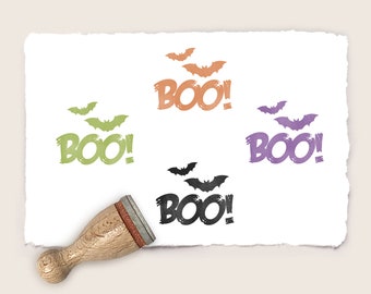 May include: Four rubber stamps with bats and the word "BOO!" in different colors: orange, green, purple, and black.