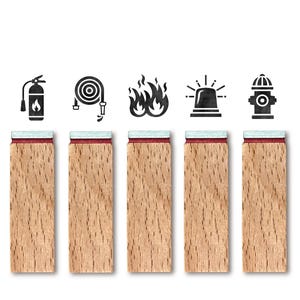 May include: Five wooden stamps featuring fire safety symbols: a fire extinguisher, a fire hose, flames, a siren, and a fire hydrant. Each stamp has a red and light blue top. The stamps are aligned in a row against a white backdrop.