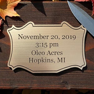 Personalized engraved plaques for deer mounts, trophies, and more! Brushed silver and gold finishes