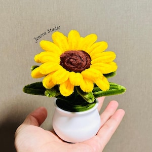 May include: A handmade wooden sign with the text "Welcome to our home" in a handwritten style. The sign is painted white with a dark stained wooden frame. The sign measures approximately 12 inches wide and 8 inches tall.