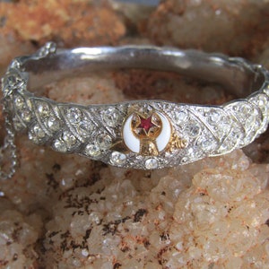 Hattie Carnegie hinged rhinestone bangle bracelet