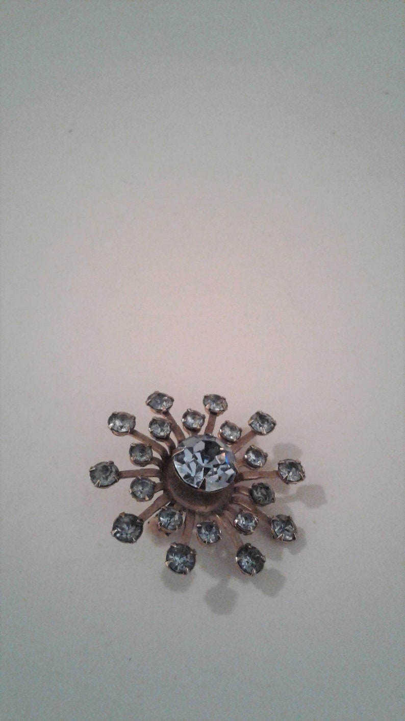 Vintage Pinwheel Flower Brooch Gold Tone And Blue Rhinestone Pin