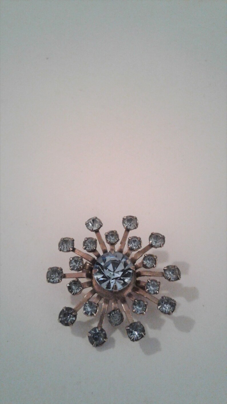 Vintage Pinwheel Flower Brooch Gold Tone And Blue Rhinestone Pin