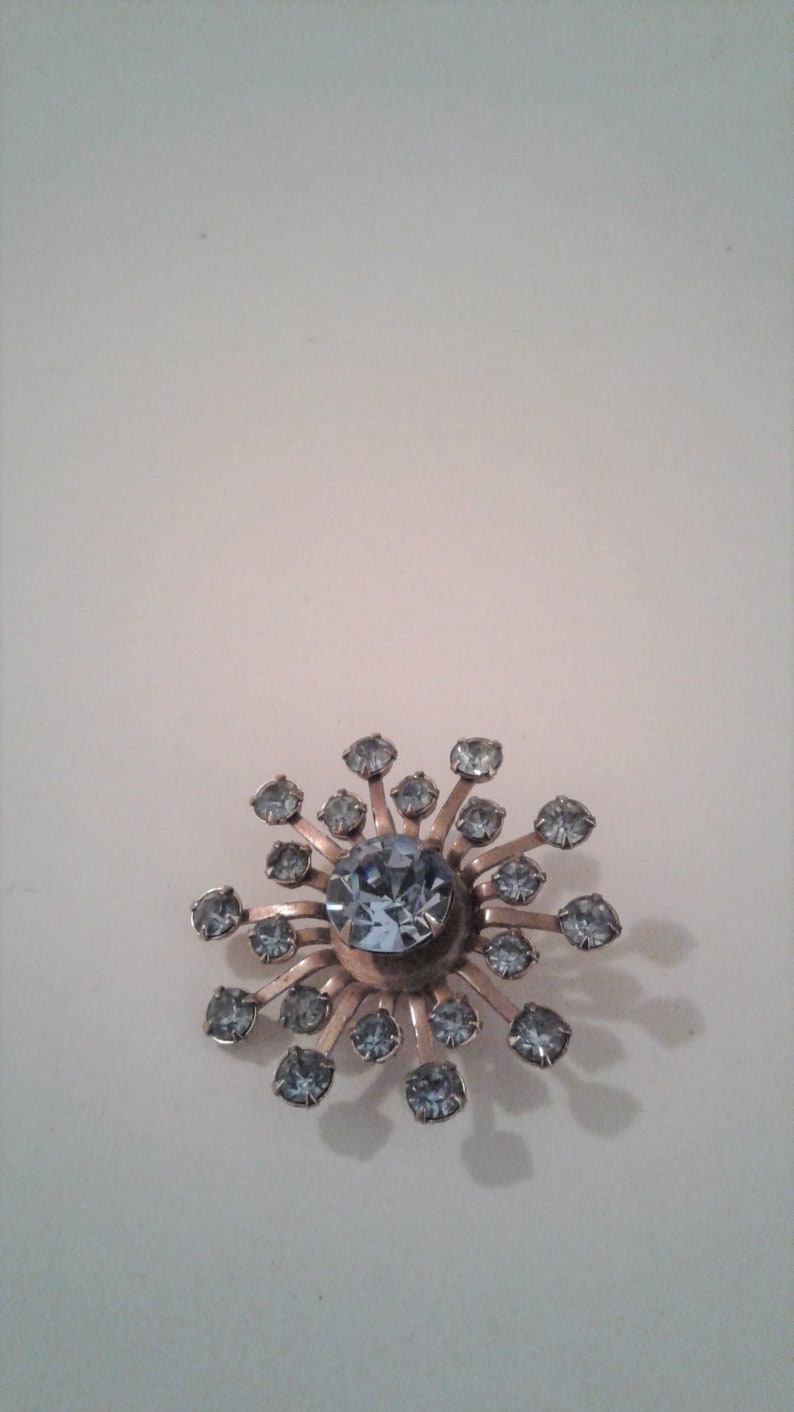 Vintage Pinwheel Flower Brooch Gold Tone And Blue Rhinestone Pin