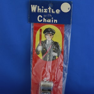 Vintage made in japan tin whistle in original package