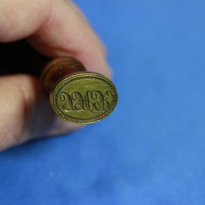 Vintage wood wax seal with initials