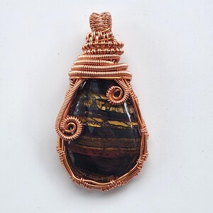 Tigers Iron Pendant