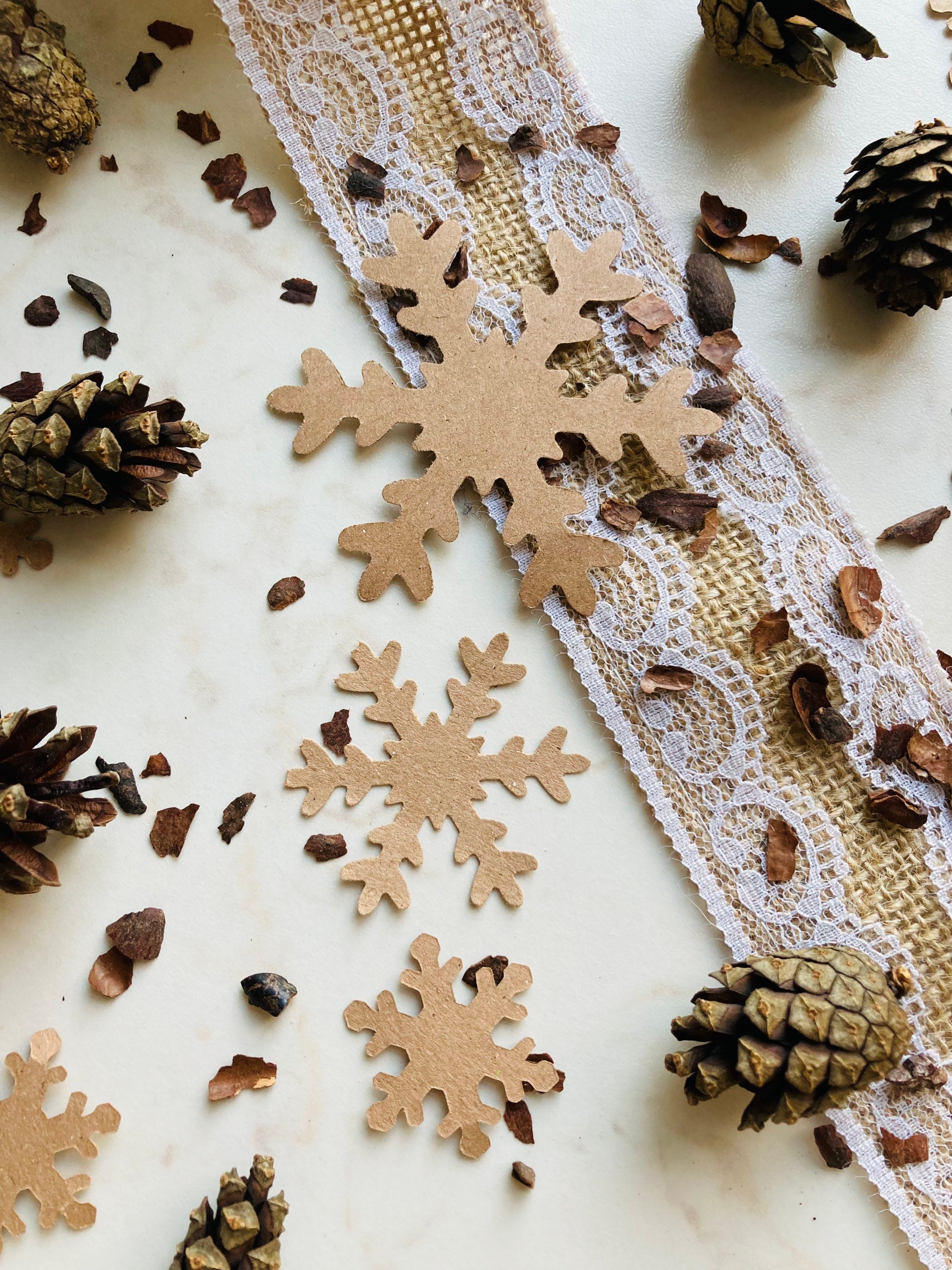 Eco friendly rustic brown snowflake confetti for your Christmas