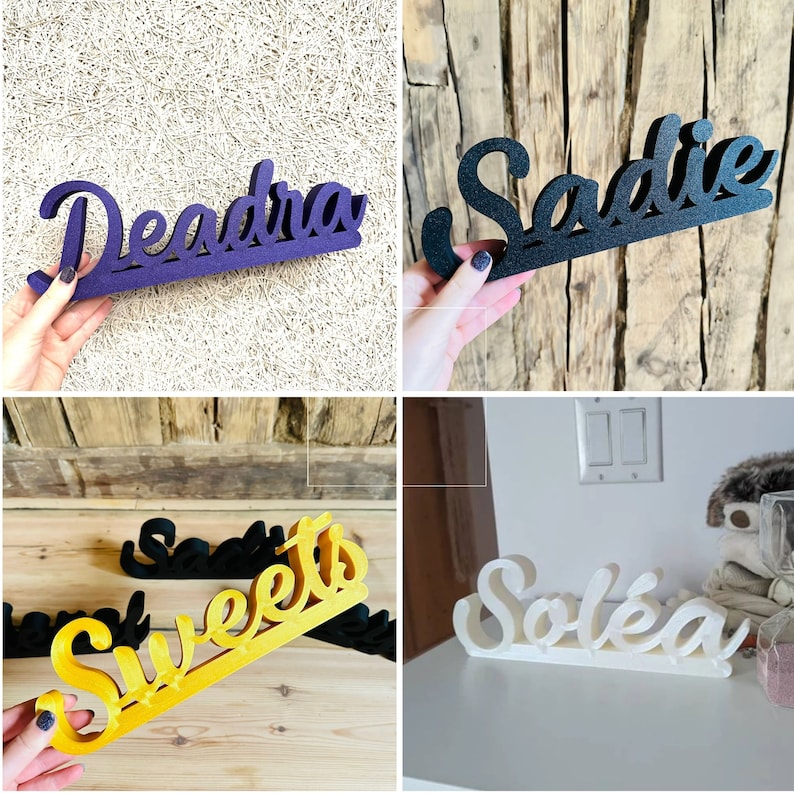 May include: Four different wooden signs with names written in cursive. The names are Deaedra, Sadie, Sweets, and Solea. The signs are painted in different colours, including purple, black, yellow, and white.