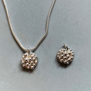 Silver Disc Pebble pendant. Stirling silver pebble granulation ball pendant.