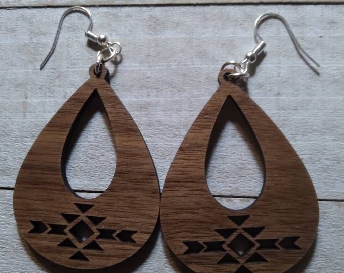 Oval Tribal Pattern Cut out on Wooden Walnut