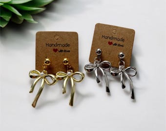 Cute bow studs gold rhodium silver dangly earrings jewellery