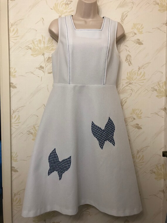 white dress with blue butterflies