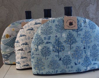 Tea cosy, blue and white woodland scene tea cosy, insulated tea cosy, trees, foxes, rabbits, hares, flowers
