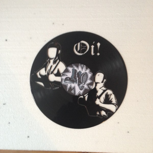 Décoration murale / horloge dans un vrai disque vinyle 33 Tours - oi! - skinhead - bird - rude boy