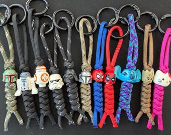 Llavero de paracord con motivos de fans, cordón para cuchillo, clip para mochila o equipaje, paracord EDC, Star Wars, Marvel, Disney y más.