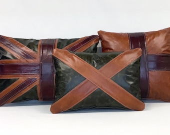 A collection of cracked leather Union cushions