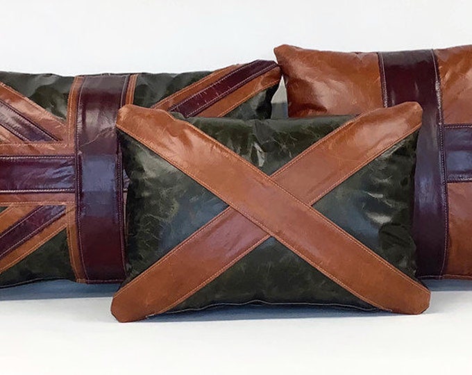 A collection of cracked leather Union cushions