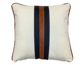 The White and tan leather twin striped cushion