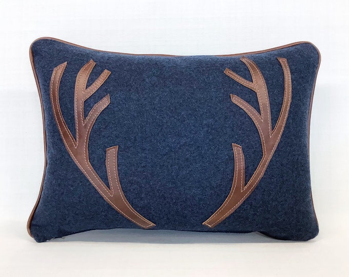 The leather and wool stag cushion