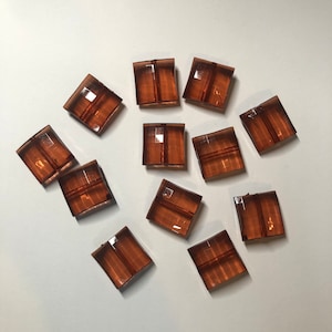 Faceted Amber colored plastic beads. 22 count, 3/4” square, 19mm
