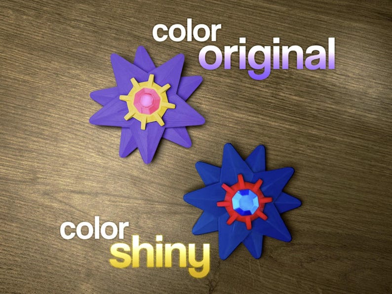 Two star-shaped objects with a flower-like design. The original is purple with yellow and pink accents. The shiny version is blue with red and blue accents. The words 'color original' and 'color shiny' are written above and below the objects.