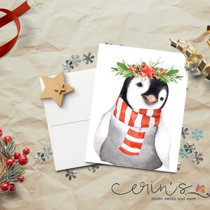 May include: A watercolor illustration of a penguin wearing a red and white striped scarf and a holly wreath on its head. The penguin is looking to the right and has a happy expression. The background is white.