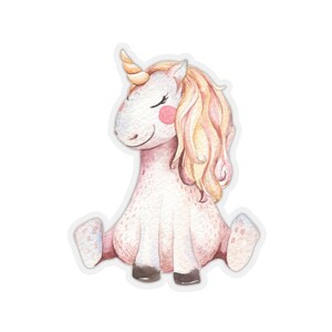 May include: A watercolor illustration of a pink and white unicorn with a yellow mane and horn. The unicorn is sitting with its legs crossed and its eyes closed.