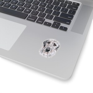 May include: A watercolor illustration of a grey and white Irish Wolfhound dog with a serious expression. The dog's head and neck are visible, and the background is white.