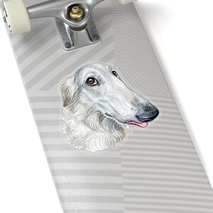 May include: A white Borzoi dog with brown eyes and a pink tongue sticking out. The dog is looking to the right of the image. The dog is on a gray and white striped background.