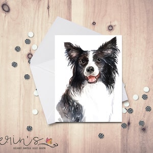May include: A watercolor painting of a black and white border collie dog with a happy expression. The dog is looking directly at the viewer.