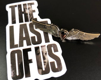 The Last Of Us Part 2 Pin Badge + TLOU Sticker | New GOLD Wings Ellie Edition Backpack Pin Badge + The Last of Us Sticker | Limited Stock...