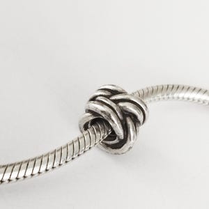Authentic Pandora Retired Sterling Silver Forget-Me-Knot Charm/ Bead - 790484