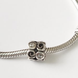 Authentic Pandora Retired Sterling Silver Swirlies Bead with Clear Zirconia - 790263CZ
