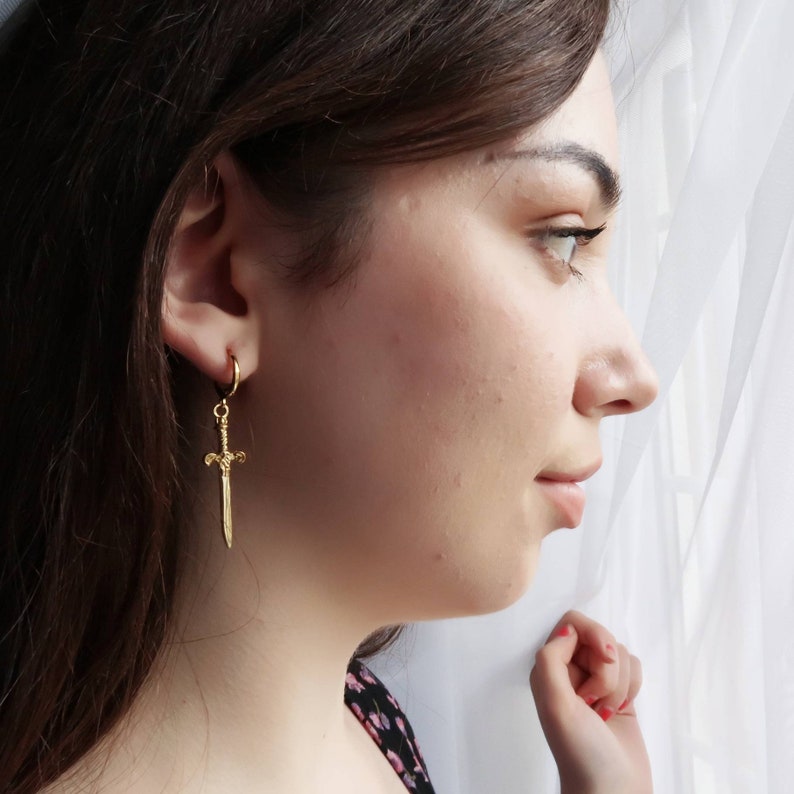 Gold sword dagger earrings unisex image 3